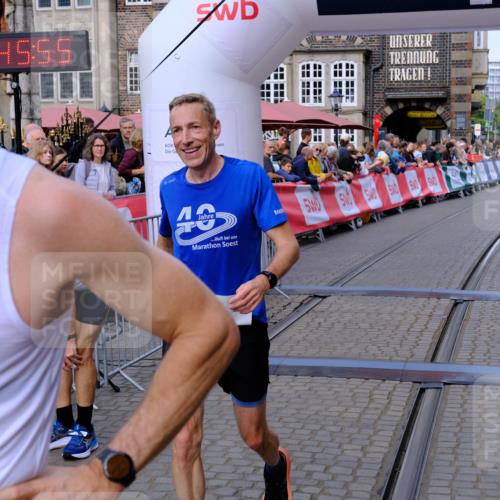 13.09.2026 - 21. swb-Marathon Bremen Tim E. http://msf.ph/oto/10300302 13.09.2026 10:41:12 Ziel 10575, 11903, 12209, 12477 meine-sportfotos.de