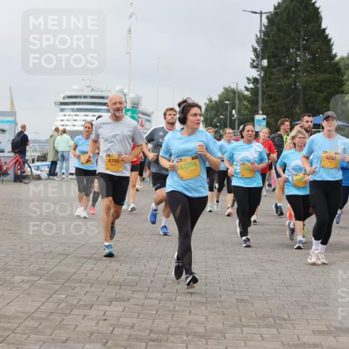 13.09.2026 - Kiel Lauf Andreas Tolksdorf http://msf.ph/oto/10411443 13.09.2026 10:02:03 Kiellinie 6760, 12204, 4250, 0276 meine-sportfotos.de