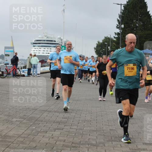13.09.2026 - Kiel Lauf Andreas Tolksdorf http://msf.ph/oto/10411961 13.09.2026 10:02:20 Kiellinie 9279, 7196, 2798, 6185 meine-sportfotos.de