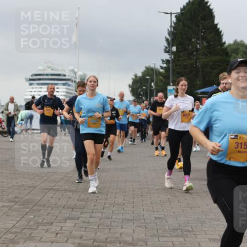 13.09.2026 - Kiel Lauf Andreas Tolksdorf http://msf.ph/oto/10415279 13.09.2026 10:06:20 Kiellinie 6051, 8933, 39, 3155 meine-sportfotos.de