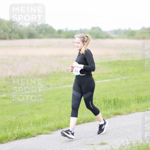 04.05.2025 - 8. Wedeler Halbmarathon Michael Strokosch http://msf.ph/oto/7816738 04.05.2025 11:38:31 Laufen 974 meine-sportfotos.de