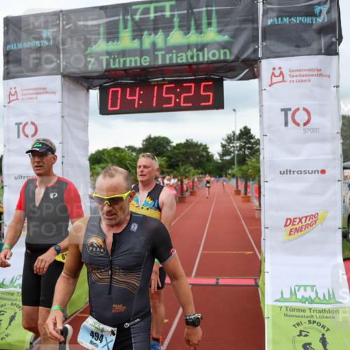 15.06.2025 - 7 Türme Triathlon Michael Strokosch http://msf.ph/oto/7982758 15.06.2025 14:15:25 Ziel 406, 494, 815, 816 meine-sportfotos.de