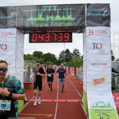 15.06.2025 - 7 Türme Triathlon Michael Strokosch http://msf.ph/oto/8001747 15.06.2025 14:37:39 Ziel 386, 585, 607 meine-sportfotos.de