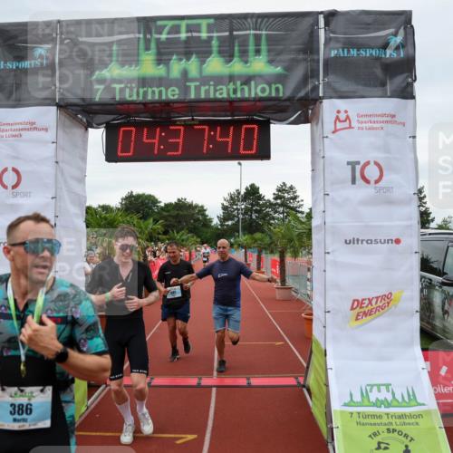 15.06.2025 - 7 Türme Triathlon Michael Strokosch http://msf.ph/oto/8001788 15.06.2025 14:37:40 Ziel 386, 585, 607 meine-sportfotos.de