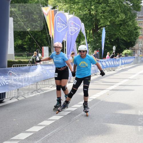 29.06.2025 - hella hamburg halbmarathon Strokosch-Dieckow http://msf.ph/oto/8190548 29.06.2025 09:31:15 Ziel 20273, 20274 meine-sportfotos.de