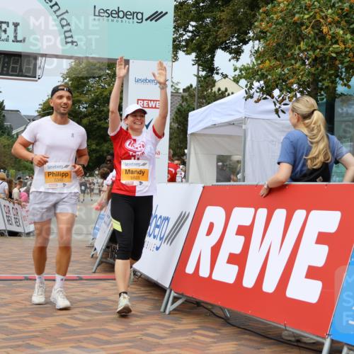 31.08.2025 - 21. Blankeneser Heldenlauf Strokosch-Dieckow http://msf.ph/oto/8700240 31.08.2025 12:39:43 Ziel 5340, 5659, 5623 meine-sportfotos.de