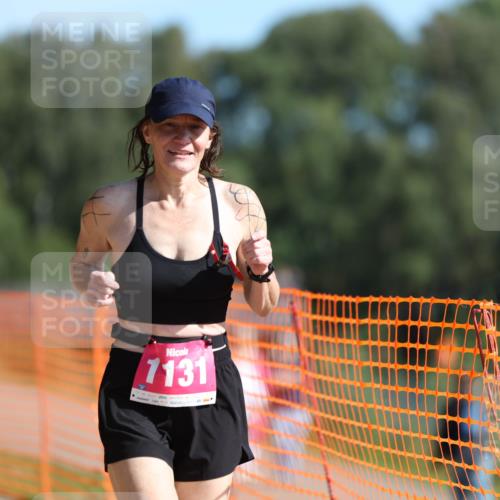 07.09.2025 - 19. Norderstedt Triathlon Michael Strokosch http://msf.ph/oto/8753470 07.09.2025 10:38:46 Laufen 646, 1131, 1139 meine-sportfotos.de