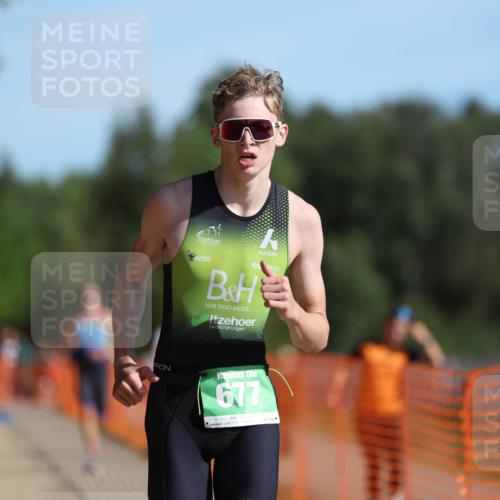 07.09.2025 - 19. Norderstedt Triathlon Michael Strokosch http://msf.ph/oto/8753666 07.09.2025 10:39:36 Laufen 654, 677 meine-sportfotos.de