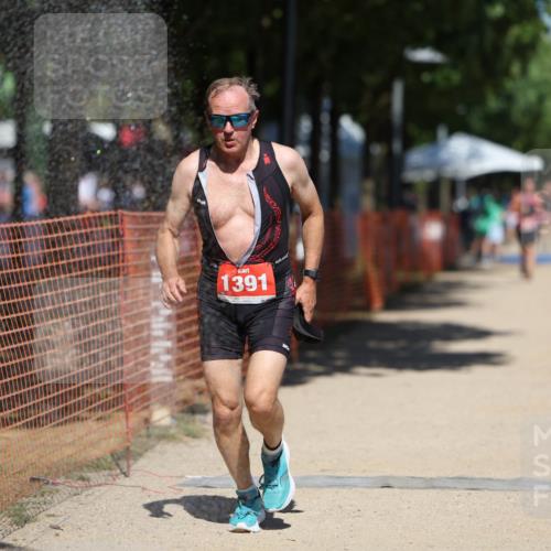 07.09.2025 - 19. Norderstedt Triathlon Michael Strokosch http://msf.ph/oto/8760427 07.09.2025 13:15:47 Laufen 1297, 1337, 1391 meine-sportfotos.de