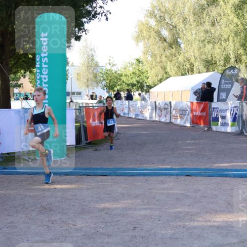 07.09.2025 - 19. Norderstedt Triathlon Zöllner http://msf.ph/oto/8769704 07.09.2025 09:14:04 Ziel 41, 49 meine-sportfotos.de