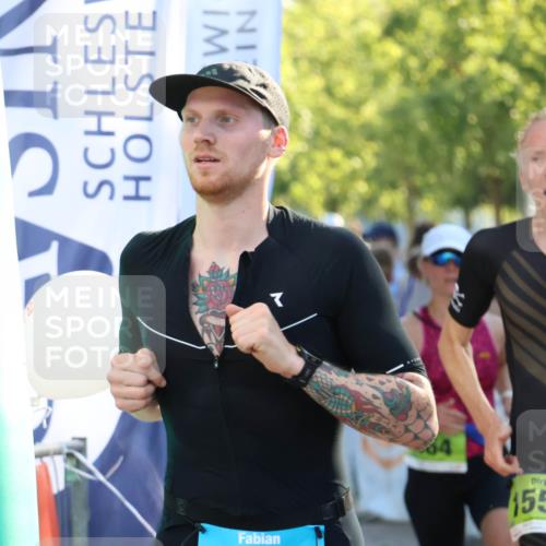 07.09.2025 - 19. Norderstedt Triathlon Zöllner http://msf.ph/oto/8772621 07.09.2025 16:49:50 Ziel 402, 464, 1556 meine-sportfotos.de