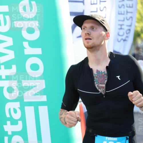 07.09.2025 - 19. Norderstedt Triathlon Zöllner http://msf.ph/oto/8772627 07.09.2025 16:49:50 Ziel 402, 464, 1556 meine-sportfotos.de