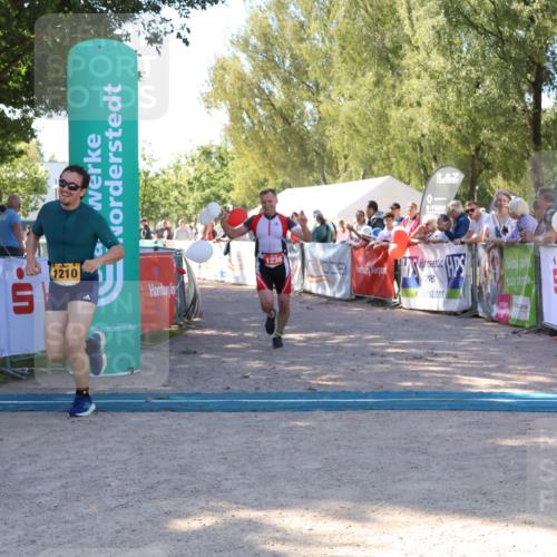 07.09.2025 - 19. Norderstedt Triathlon Zöllner http://msf.ph/oto/8777088 07.09.2025 12:08:45 Ziel 1210, 1236 meine-sportfotos.de