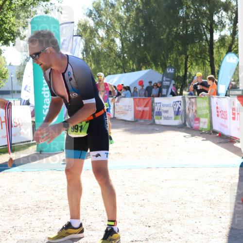 07.09.2025 - 19. Norderstedt Triathlon Zöllner http://msf.ph/oto/8785348 07.09.2025 15:29:40 Ziel 1020, 1027 meine-sportfotos.de