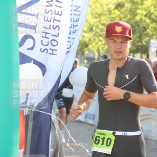 07.09.2025 - 19. Norderstedt Triathlon Zöllner http://msf.ph/oto/8792491 07.09.2025 16:37:35 Ziel 1051, 1591, 1610 meine-sportfotos.de