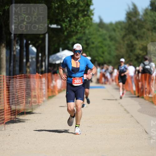 07.09.2025 - 19. Norderstedt Triathlon Michael Strokosch http://msf.ph/oto/8800503 07.09.2025 12:30:33 Laufen 303, 703, 1294 meine-sportfotos.de