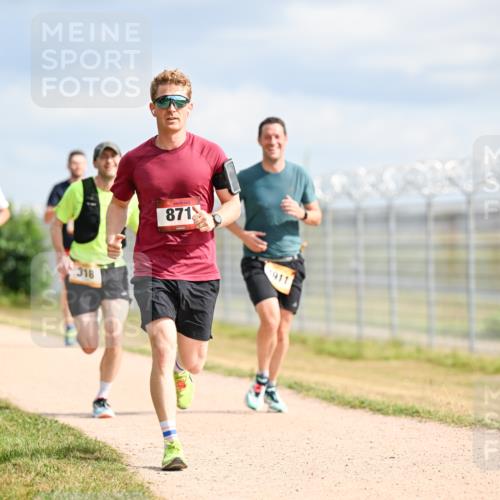 14.09.2025 - Airport Race Dr. Thomas Lammeyer http://msf.ph/oto/8865354 14.09.2025 12:05:48 Laufen 318, 8718, 911 meine-sportfotos.de