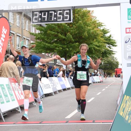 21.09.2025 - PSD Bank Halbmarathon Strokosch-Dieckow http://msf.ph/oto/8938336 21.09.2025 12:47:19 Ziel 3420, 3421 meine-sportfotos.de