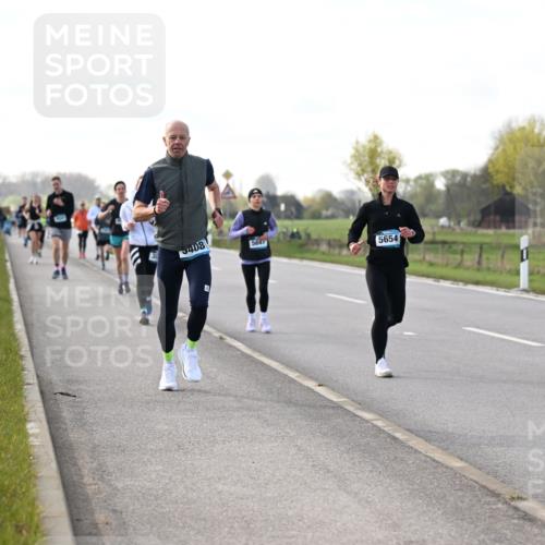 12.04.2026 - 45. Internationalen Wilhelmsburger Insellauf Dr. Thomas Lammeyer http://msf.ph/oto/9443520 12.04.2026 10:16:06 Laufen 408, 5647, 5654 meine-sportfotos.de