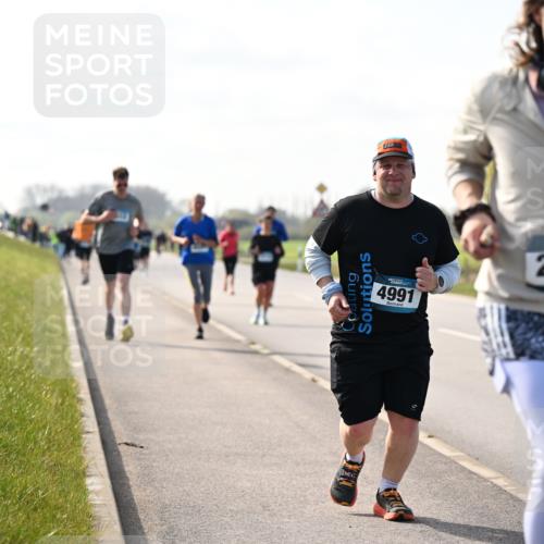 12.04.2026 - 45. Internationalen Wilhelmsburger Insellauf Dr. Thomas Lammeyer http://msf.ph/oto/9446607 12.04.2026 10:27:18 Laufen 4991, 2988, 51 meine-sportfotos.de