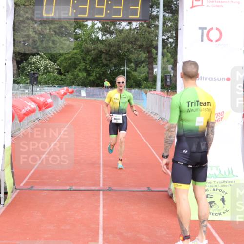 14.06.2026 - 7 Türme Triathlon Andreas Tolksdorf http://msf.ph/oto/9802230 14.06.2026 12:09:31 Ziel 460, 461, 462, 463 meine-sportfotos.de