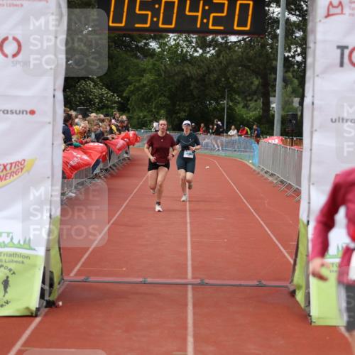 14.06.2026 - 7 Türme Triathlon Andreas Tolksdorf http://msf.ph/oto/9806456 14.06.2026 16:04:19 Ziel 940, 1561, 1595 meine-sportfotos.de