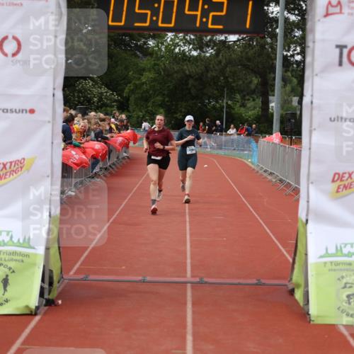 14.06.2026 - 7 Türme Triathlon Andreas Tolksdorf http://msf.ph/oto/9806457 14.06.2026 16:04:20 Ziel 940, 1561, 1595 meine-sportfotos.de