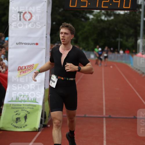 14.06.2026 - 7 Türme Triathlon Andreas Tolksdorf http://msf.ph/oto/9806994 14.06.2026 16:12:38 Ziel 1399, 1403, 1427 meine-sportfotos.de
