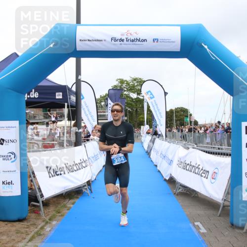 16.08.2026 - KN Förde Triathlon 2026 Markus Tischler http://msf.ph/oto/9995947 16.08.2026 11:51:30 Ziel 304, 304 meine-sportfotos.de