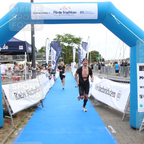 16.08.2026 - KN Förde Triathlon 2026 Markus Tischler http://msf.ph/oto/9996360 16.08.2026 11:56:56 Ziel 310, 323, 329, 310, 323, 329 meine-sportfotos.de