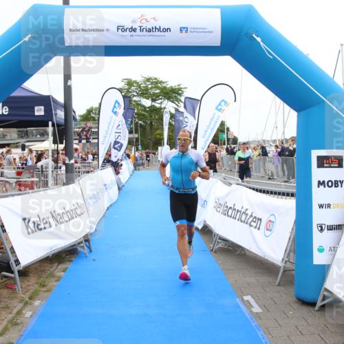 16.08.2026 - KN Förde Triathlon 2026 Markus Tischler http://msf.ph/oto/9996429 16.08.2026 11:58:25 Ziel 318, 318 meine-sportfotos.de