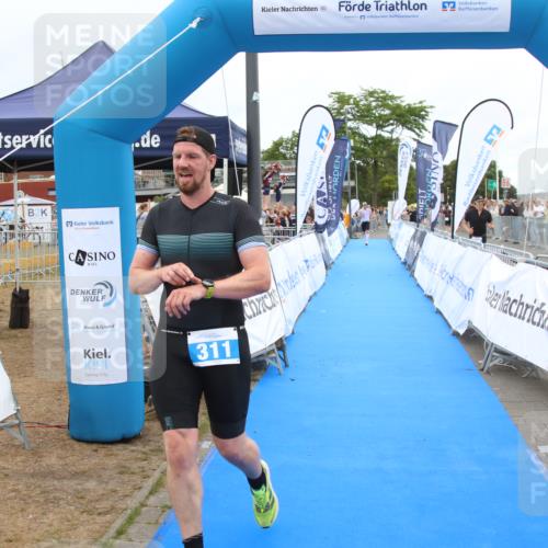 16.08.2026 - KN Förde Triathlon 2026 Markus Tischler http://msf.ph/oto/9996503 16.08.2026 11:58:38 Ziel 311, 321, 311, 321 meine-sportfotos.de