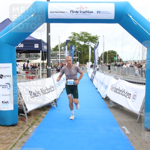 16.08.2026 - KN Förde Triathlon 2026 Markus Tischler http://msf.ph/oto/9999276 16.08.2026 12:13:41 Ziel 316, 316 meine-sportfotos.de