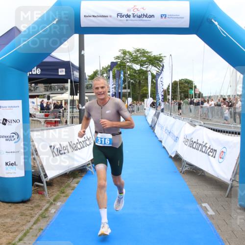 16.08.2026 - KN Förde Triathlon 2026 Markus Tischler http://msf.ph/oto/9999603 16.08.2026 12:13:41 Ziel 316, 316 meine-sportfotos.de