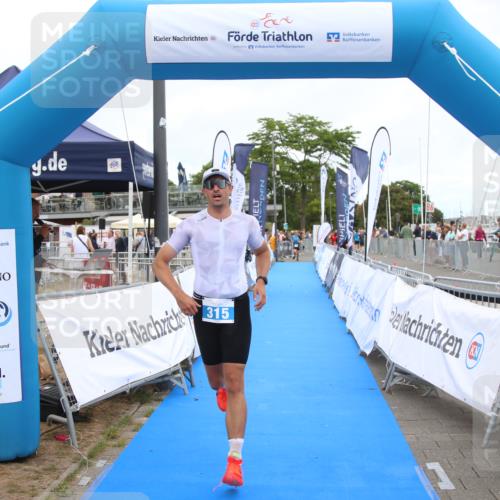 16.08.2026 - KN Förde Triathlon 2026 Markus Tischler http://msf.ph/oto/9999778 16.08.2026 12:15:03 Ziel 315, 411, 315, 411 meine-sportfotos.de